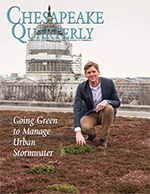 issue cover - John Hill crouches over a green roof overlooking the U.S. Capitol. His organization, the United Methodist General Board of Church and Society, installed the 6,800-square-foot vegetated roof in 2014 to reduce stormwater runoff and cut costs for air conditioning. Photograph, Skip Brown