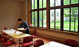 Koyla Braun-Greiner at a table. Photograph, Michael W. Fincham