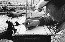 An oyster buyer records a day's catch. Photograph courtesy of the Chesapeake Bay Maritime Museum