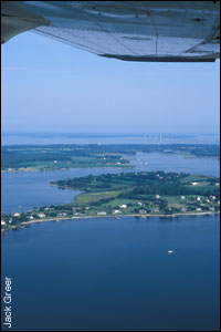 View of the Bay from the airplane showing Kent Island - by Jack Greer