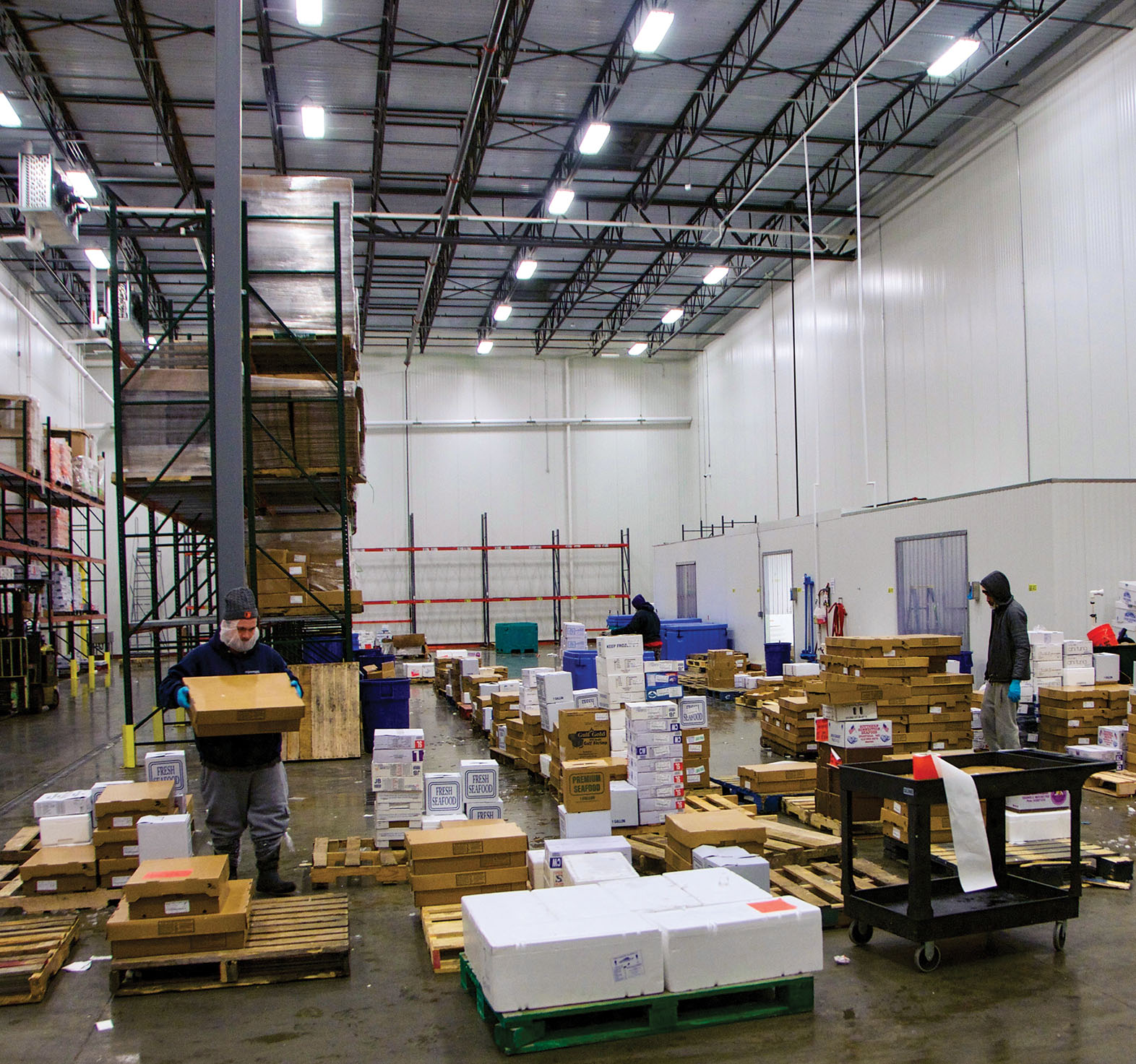 In the new facilities at Jessup and next to it, workers wear oilskin overalls, head coverings, and gloves. They cut fish on sanitized surfaces with clean knives. Boxes are organized on palettes for shipping, and inspectors from the company and government agencies routinely check to ensure that everything is sanitary and clean.