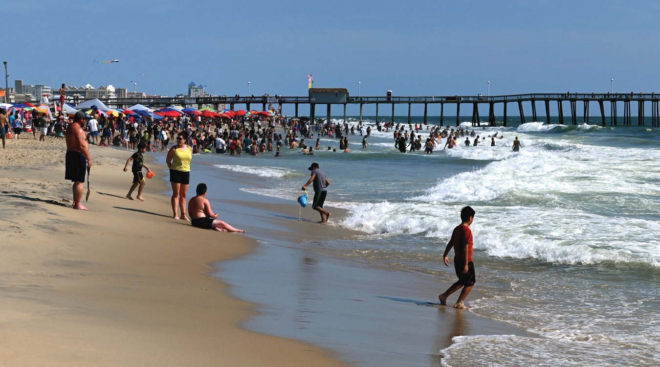 Visitors enjoy the beach at Ocean City, Md. Photo, Lisa Tossey/MDSG