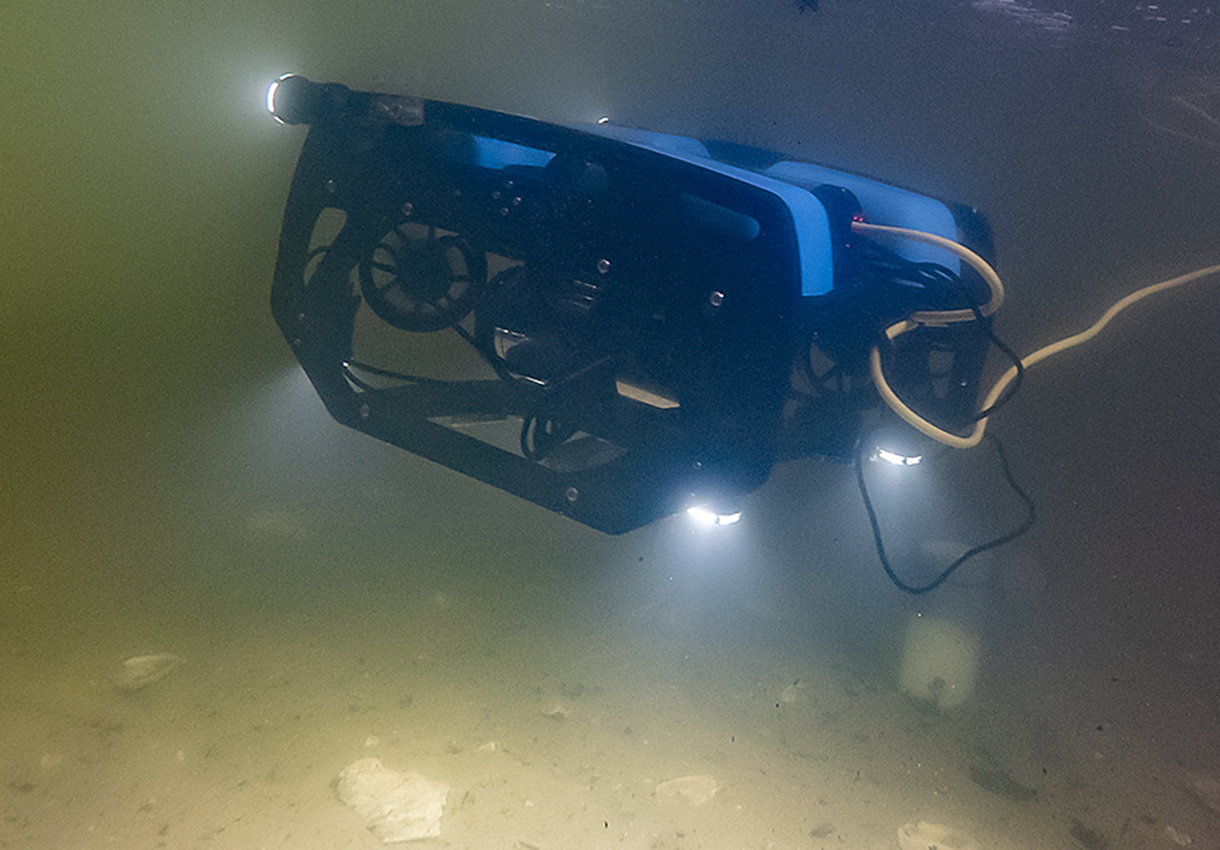 Robotic submersible hovering over muddy bay bottom. Photo, David Harp/Chesapeake Bay Journal