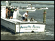 Boat backing up to the dock