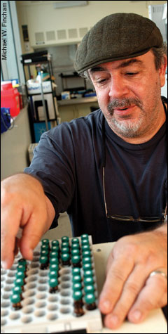 Alan Place in his lab - photo by Michael W. Fincham