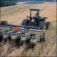 A farmer plants cover crops by National Resources Conservation Service