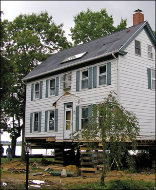 The Hankins house getting repaired by Bud and Harriett Hankin