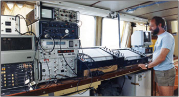 Steve Colman monitors on-board data-recording gear. Photograph courtesy of the U.S. Geological Survey