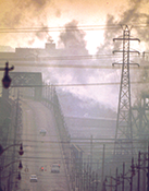 Dark clouds of factory smoke obscure Clark Avenue Bridge in Cleveland, Ohio, in 1973. Photograph, Frank J. Aleksandrowicz, National Archives and Records Administration collection