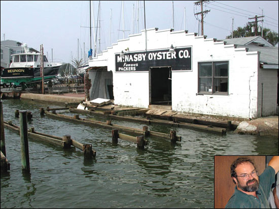 Waves crashed over the top of the Annapolis Maritime Museum, located in the former McNasby Oyster Company packing plant. Photograph by Annapolis Maritime Museum