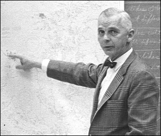 Gene Cronin teaching and pointing to a site on a map of the Bay