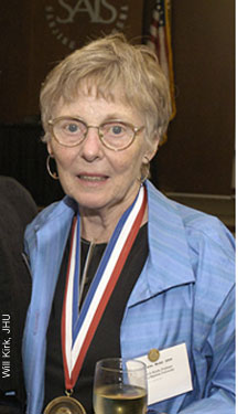 Grace Brush with medal - Will Kirk, JHU