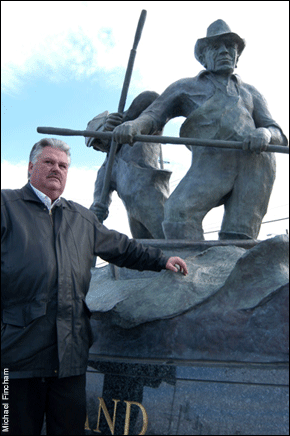 George O'Donnell next to the Maryland Waterman's Monument