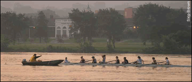 One of a number of local rowing teams that practice on the Anacostia in the early morning light - by Skip Brown