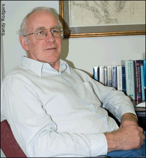 Victor Kennedy sitting by a map of the Bay by Sandy Rodgers