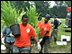 Students planting grass in the Anacostia